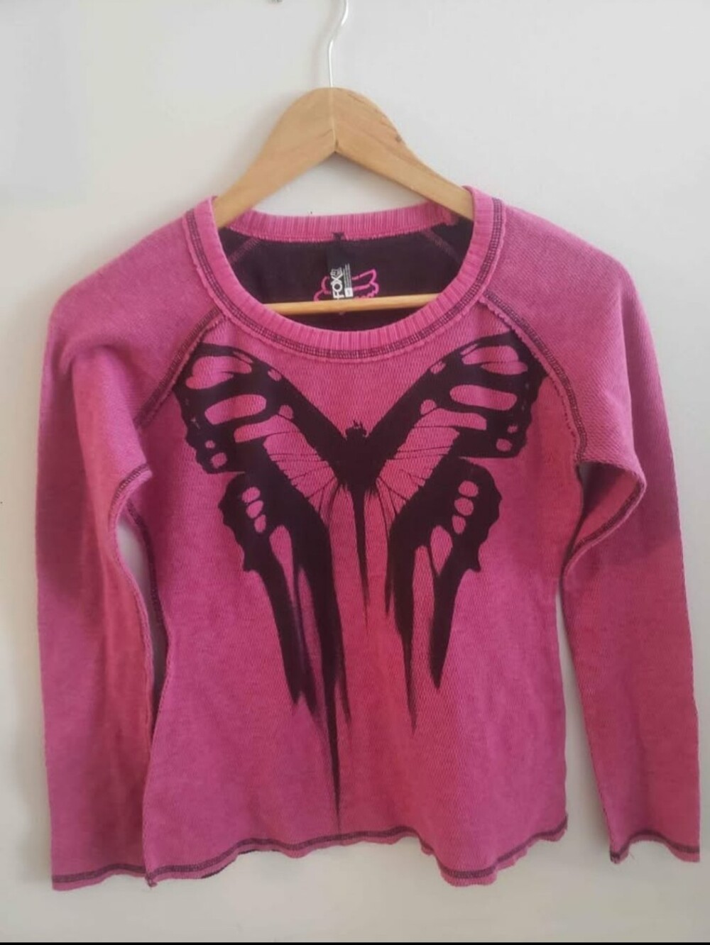 Fox Pink Crewneck Sweater with Black Butterfly Graphic